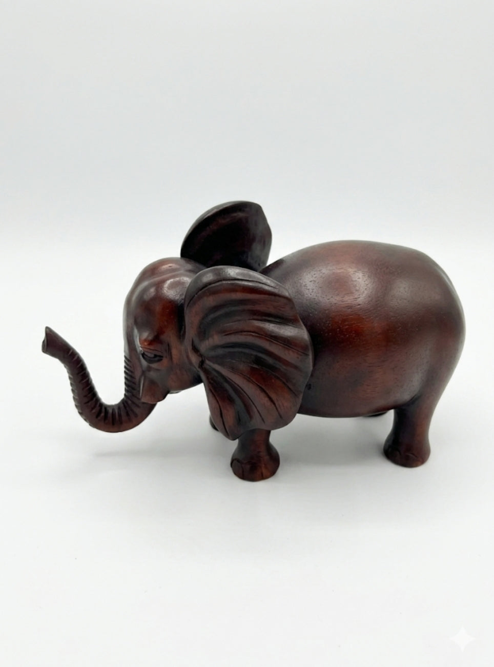 ESTATUA DE ELEFANTE TALLADA EN MADERA CAOBA